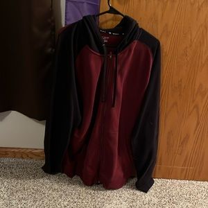 This is a Tek Gear XXL zipper jacket. It’s got a hoodie and pockets.